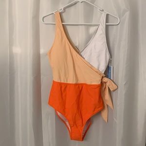 NWT One piece bathing suit, side knot